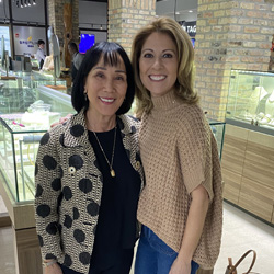 Two women in Bere smiling at the camera.